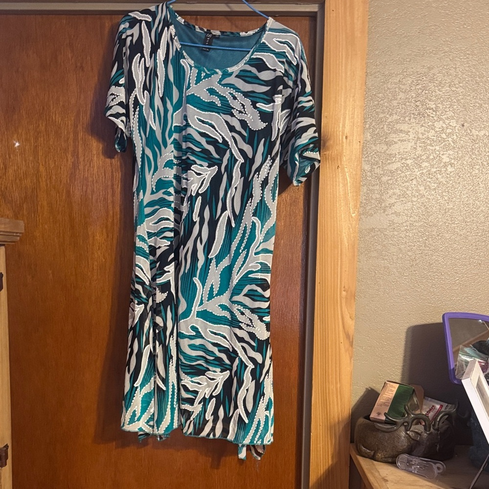 Vibrant Teal and Black Patterned Mini Dress